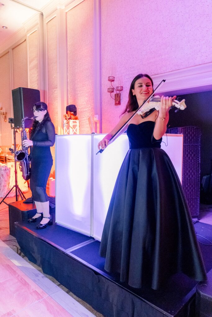 Hybrid DJ group with electric violinist and saxophone player at Dunlin Resort, Kiawah River